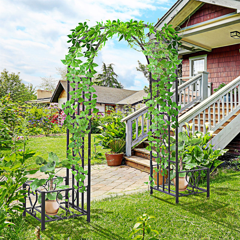 Tonnelle de jardin en acier avec cœurs de volutes, boîtes à fleurs