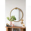Miroir mural 30X31 "avec finition dorée et écusson décoratif