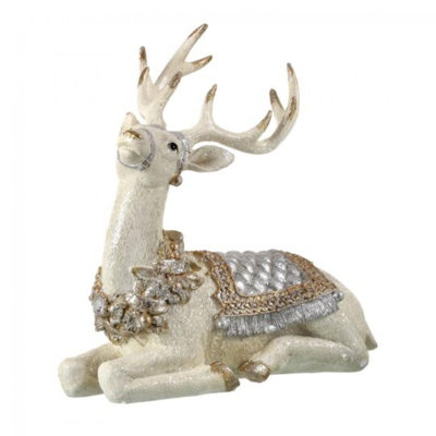 Figurine cerf ivoire avec selle dorée et argentée