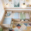 Lit plateforme simple en forme de L avec trois tiroirs de rangement