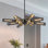 Silhouette de lustre spoutnik industriel moderne à 8 lumières avec abat-jours cylindriques en maille noire et dorée