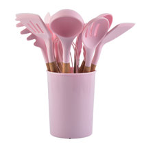 Premium Photo  Pink kitchen utensils on blue, home kitchen tools