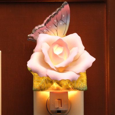 Papillon avec veilleuse paix rose