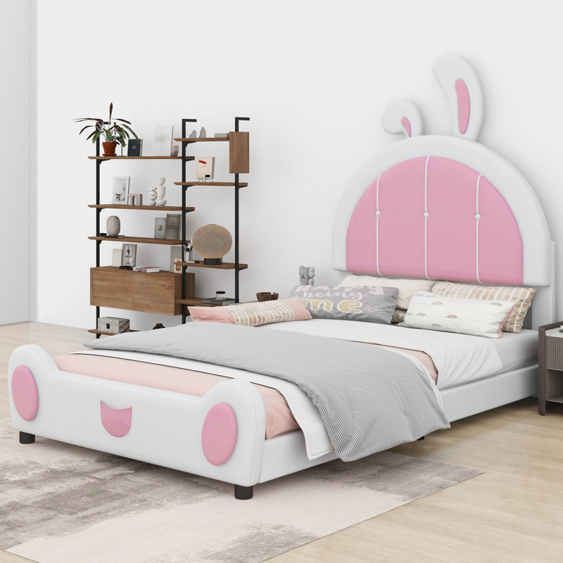 Lit plateforme tapissier avec tête de lit en forme de lapin