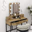 Coiffeuse moderne brune avec miroir Hollywood et 9 lumières à DEL à intensité variable, coiffeuse à maquillage avec 4 tiroirs de rangement