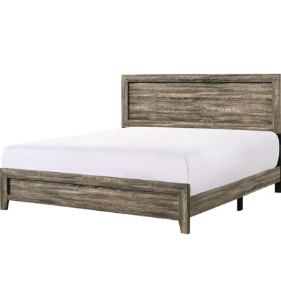 Très grand lit à panneaux gris en bois pour le confort de la chambre à coucher