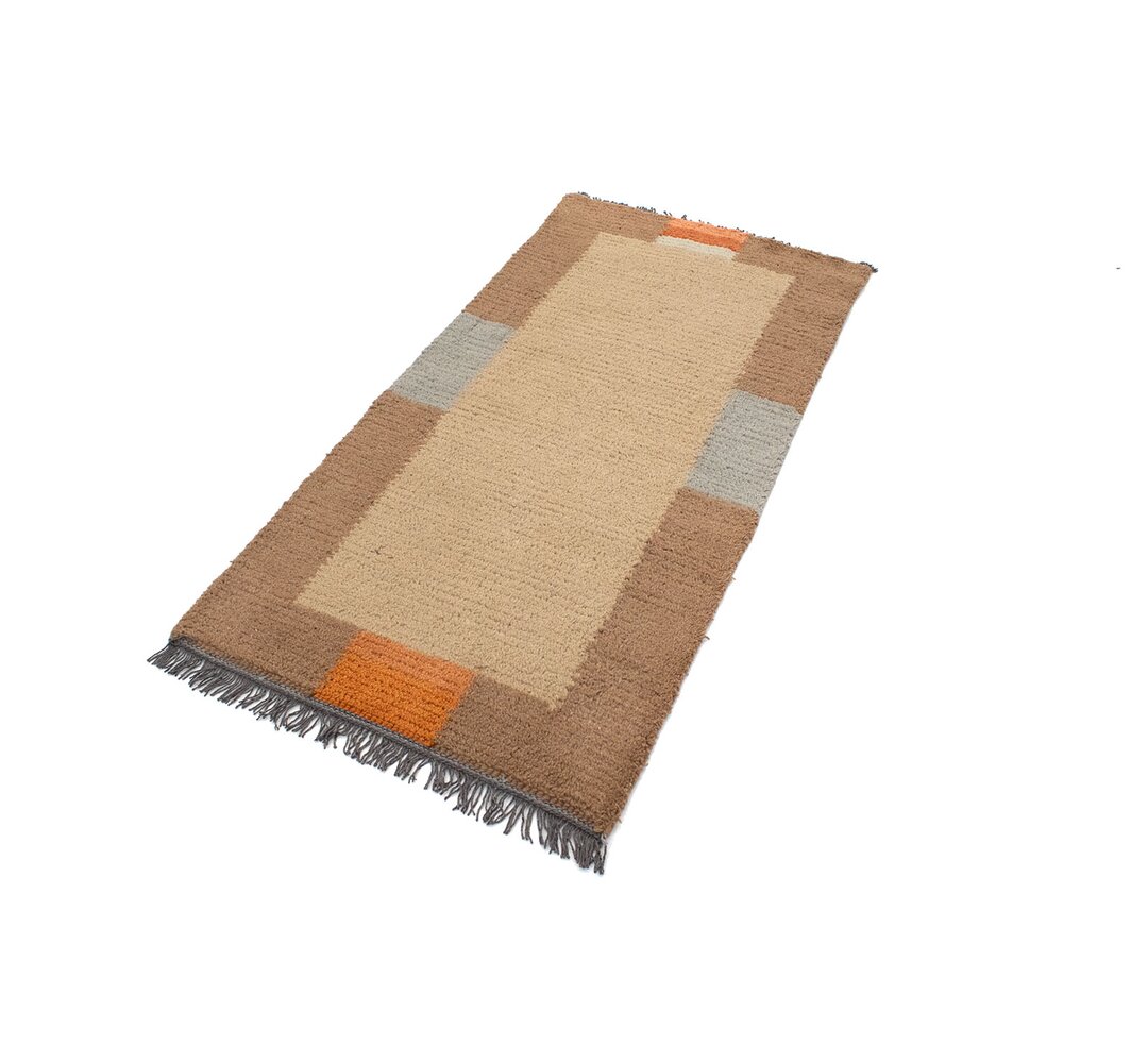 Handgefertigter Teppich Morrisey aus Wolle in Beige