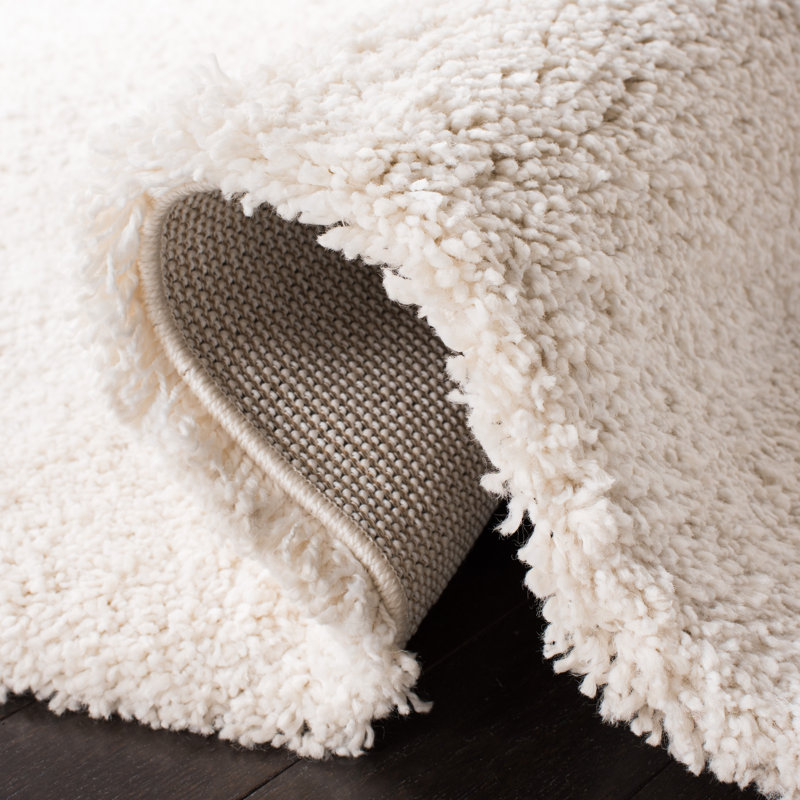 Solid Colour Machine Woven Polypropylene Area Rug in Cream, Rectangle 6'7" x 9'