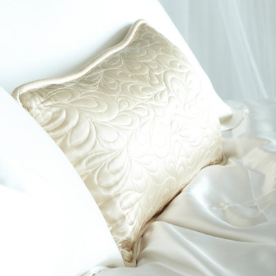 Coussin matelassé champagne