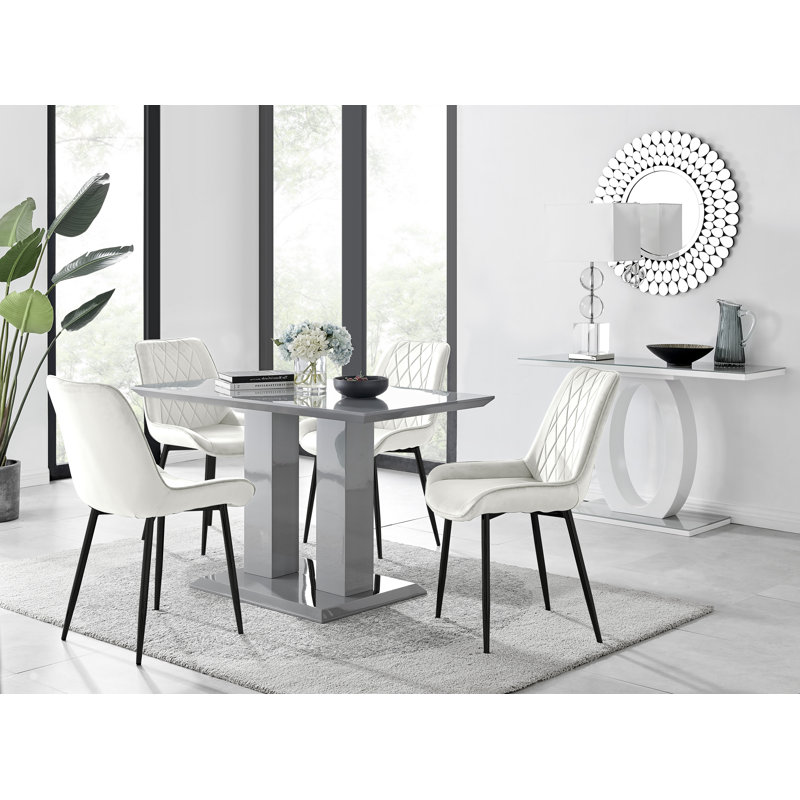 Eubanks High Gloss Double Pillar Dining Table Set with 4 Luxury Velvet Upholstered Dining Chairs