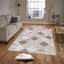 Tapis rose / beige en polyester tissé à la machine Essence-760342585