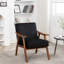Fauteuil en velours noir avec base en bois massif - ajoute une touche décorative Chic