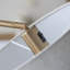 Clement Floor light finished in Warm Brass and Natural