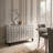 Modern Glam 59.5" Silver Leaf Accent Cabinet Featuring Geometric Textured Doors