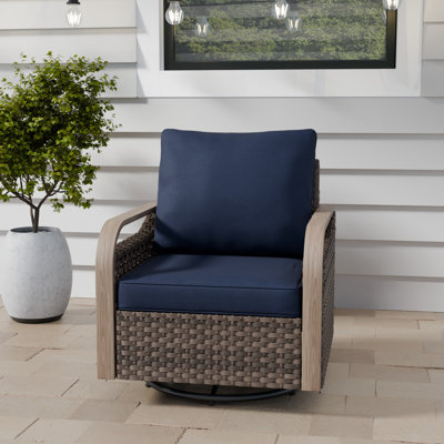 Chaise de patio berçante rotative en osier avec coussins