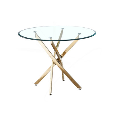 Table de salle à manger ronde contemporaine en verre trempé transparent avec pieds en acier inoxydable à finition dorée