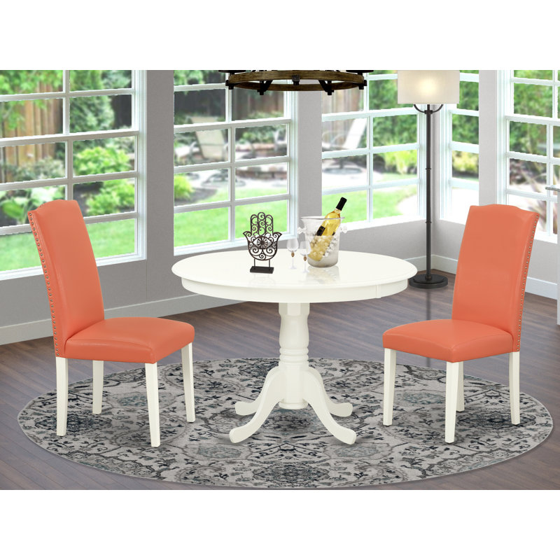 3 Piece Modern Dining Table Set Contains a Round Wooden Table with Pedestal and 2 Pink Flamingo Faux Leather Upholstered Chairs, Linen White