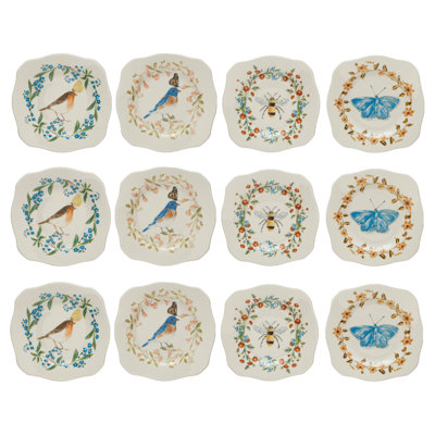 Assiettes en grès avec faune peinte et bordure festonnée