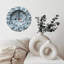Horloge murale blanche texturée