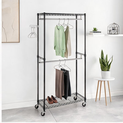 Organisateur de vêtements à roulettes verrouillables avec cadre en acier pour le rangement de la chambre à coucher
