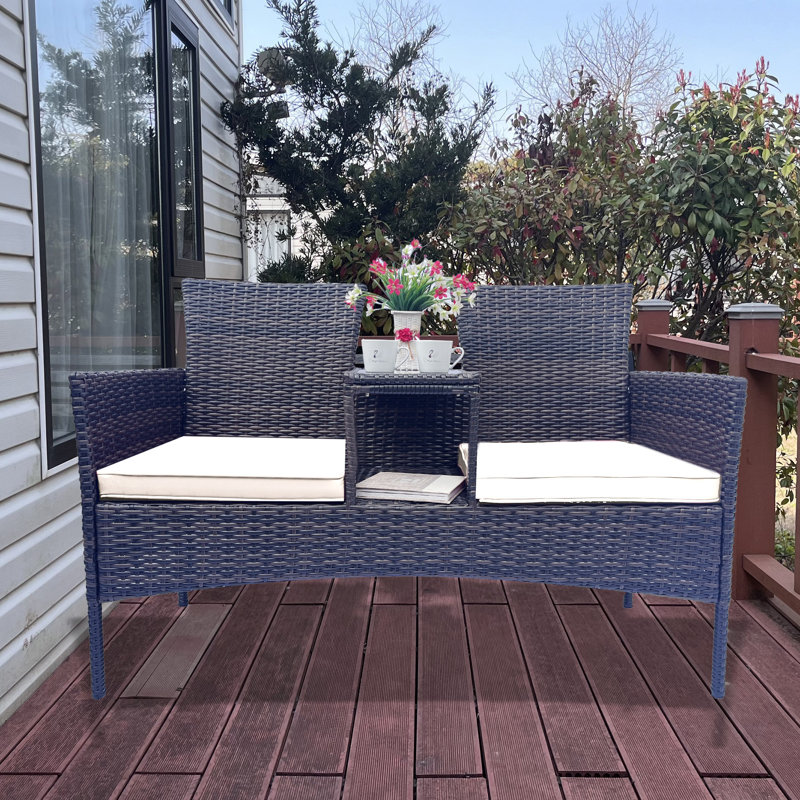 Ensemble de conversation ergonomique pour l'extérieur en osier avec coussins et table