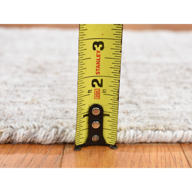 Tapis unique gris de 1 pi 6 po x 1 pi 6 po srija