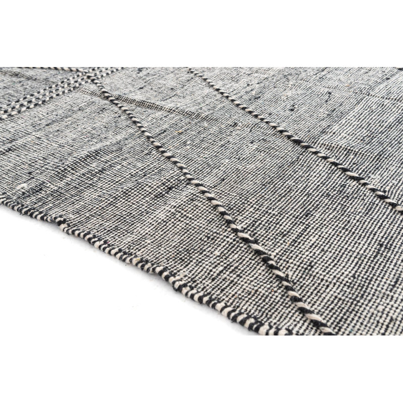 Tapis noir et blanc Orpheus