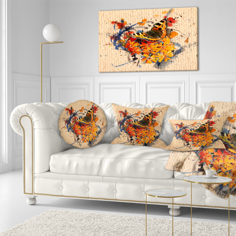 Coussin floral et art abstrait sur papier