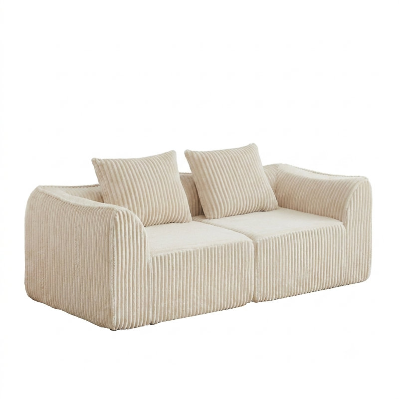 Canapé minimaliste incurvé avec dossier incliné et coussins décoratifs en forme de corne, Beige