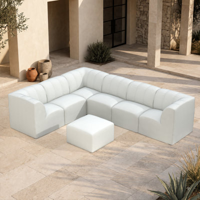 Canapé modulaire rembourré en L avec repose-pieds et coussins Sunbrella 7 pièces Praia