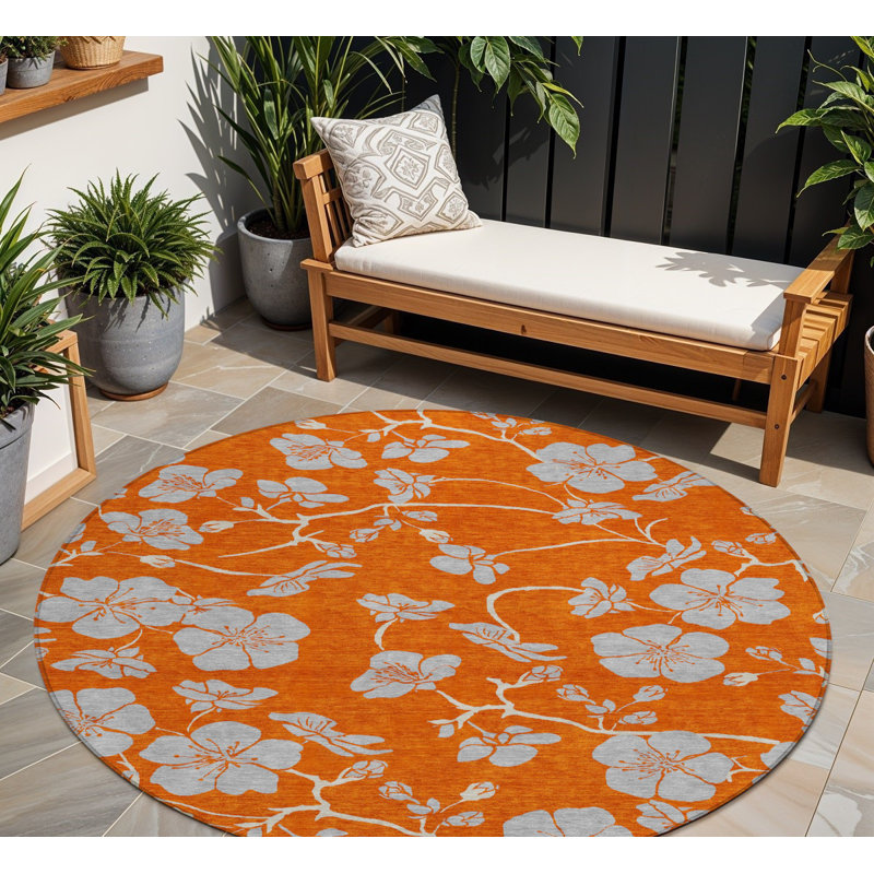 Tapis extérieur rond lavable floral orange et gris 8 pi