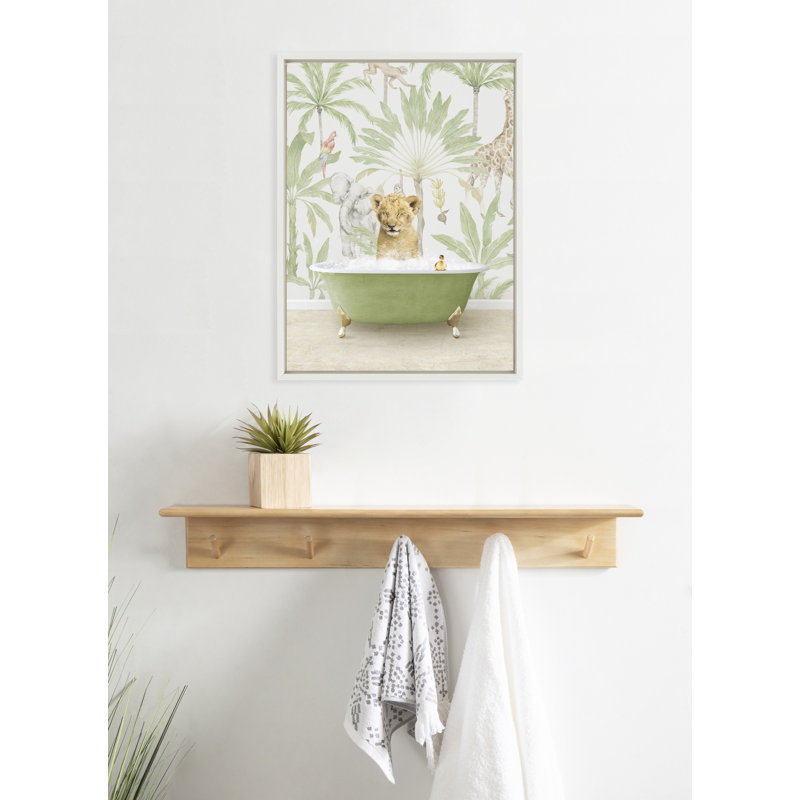 «Lion Cub in Wild Safari Bath» par Amy Peterson, reproduction d'art sur toile encadrée
