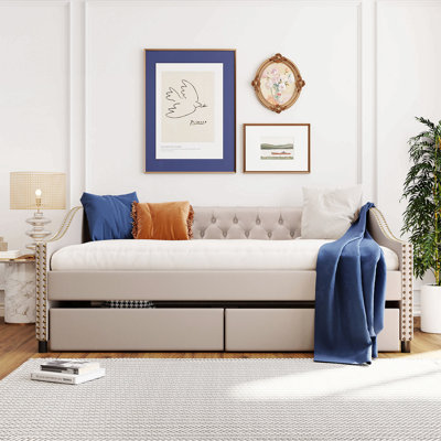 Lit de jour confortable avec deux tiroirs et fabrication robuste pour une utilisation polyvalente