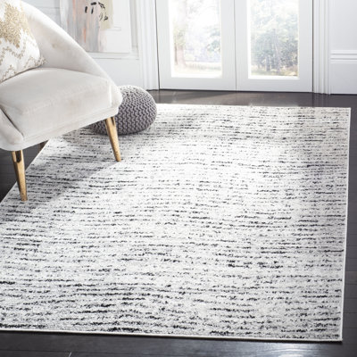 Riebe Abstract Ivory/Silver Area Rug