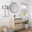 Meuble-lavabo élégant avec tiroirs à fermeture en douceur et lavabo en céramique
