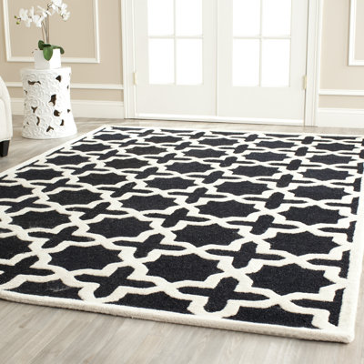 Tapis noir / ivoire en laine touffeté à la main à motif géométrique d'Igna