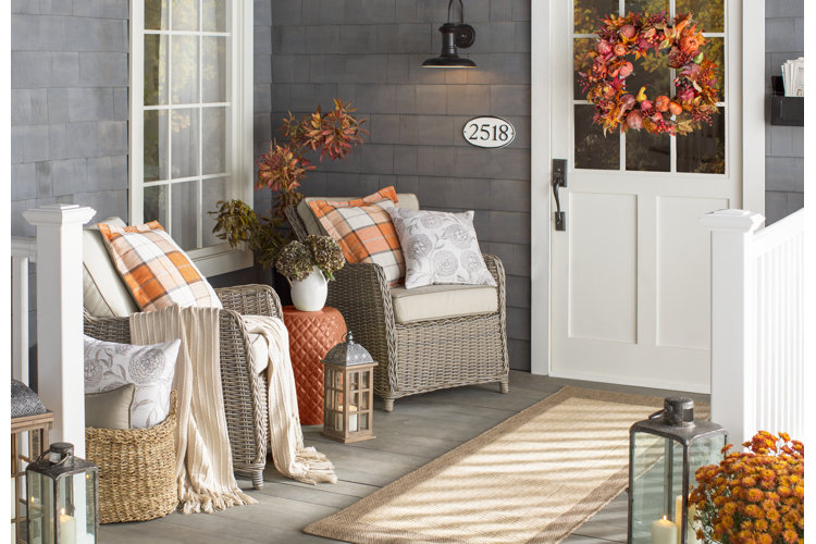 fall wreath on a white front door