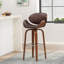 Élégant tabouret de bar en bois d'hévéa avec siège confortable et fabrication durable, parfait pour les cuisines et les bars modernes.
