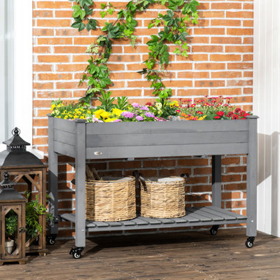 Lit de jardin surélevé Outsunny, jardinière en bois surélevée avec roues verrouillables, tablette de rangement et doublure de lit pour la cour arrière, le patio