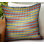 Coussin décoratif à rayures vives à rayures rouges, bleues et jaunes Plutus