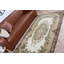 Tapis turc authentique tissé à motif floral traditionnel dans des tons de terre pour une décoration intérieure élégante