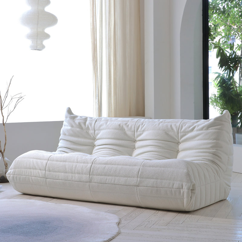 Canapé chenille beige moelleux à trois places
