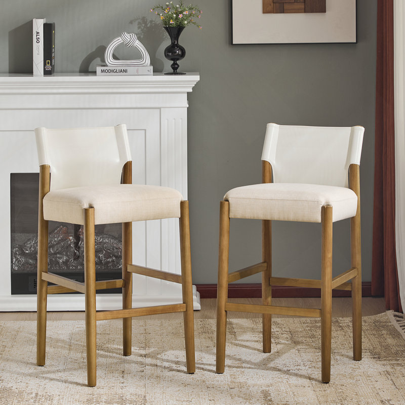 Ensemble de tabourets de bar en tissu noir d'inspiration Mid-Century, siège rembourré confortable avec structure en bois d'hévéa robuste pour une décoration intérieure élégante.