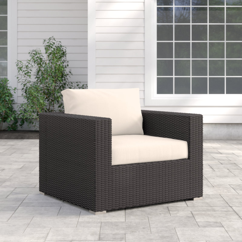Fauteuil d'extérieur en rotin avec coussins Convene, Beige