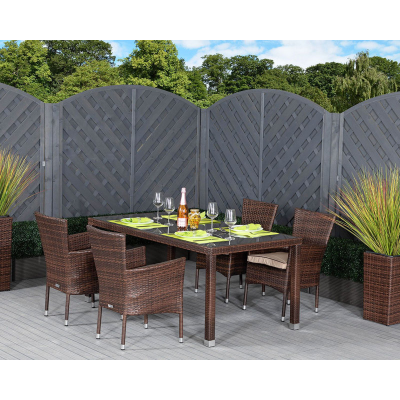 Finn 4 - Person Patio Dining Set Umbrella Hole Included Rectangular Table with Cushions Included, Chocolate/Coffee Cream