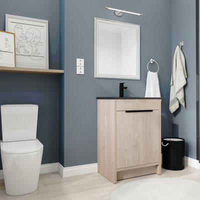 Meuble-lavabo autoportant de 24 po avec lavabo en céramique et 2 portes d'armoire à fermeture en douceur