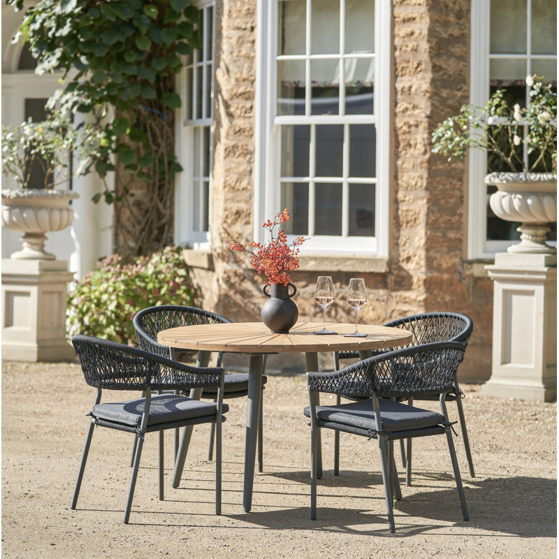 Taopi 4 - Person Acacia Patio Dining Set with Round Table , Cushions Included