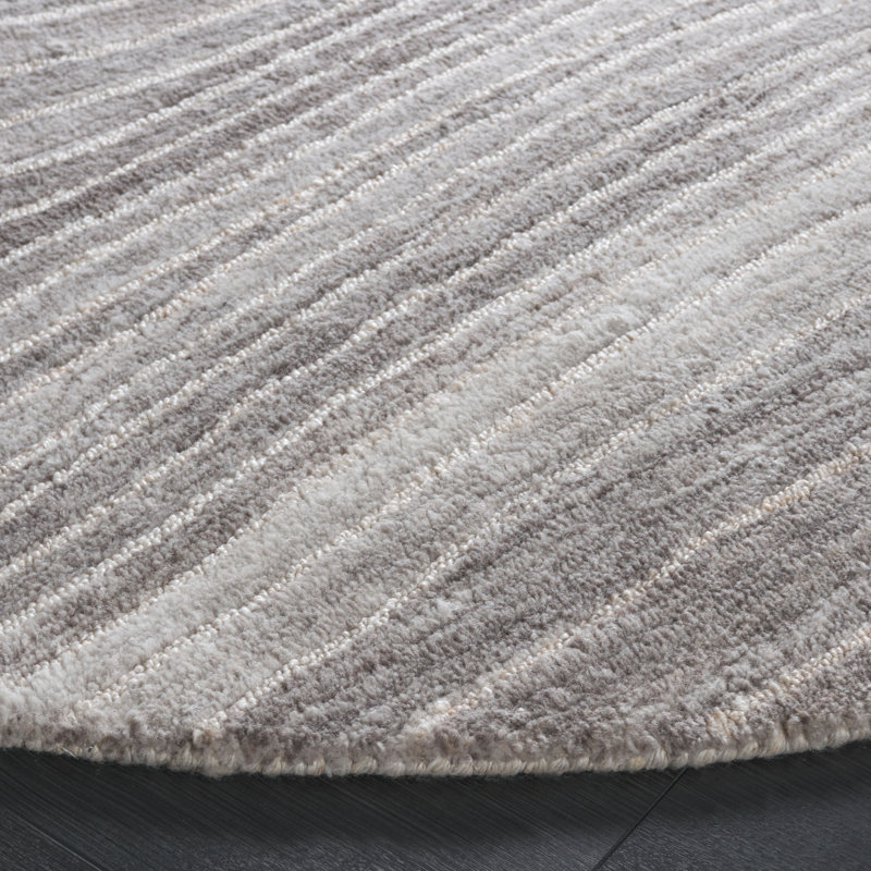Jeaneen Hand Tufted Performance Abstract Rug, Round 6'