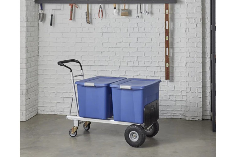 blue plastic tote on a moving dolly