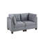 Canapé d'angle gris en lin avec coussin et pieds en bois